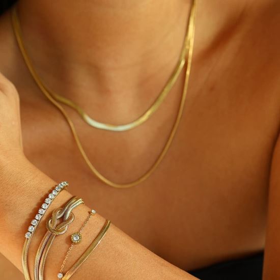 Immagine di Bracciale donna in acciaio placcatura oro18K- Snake Nodo